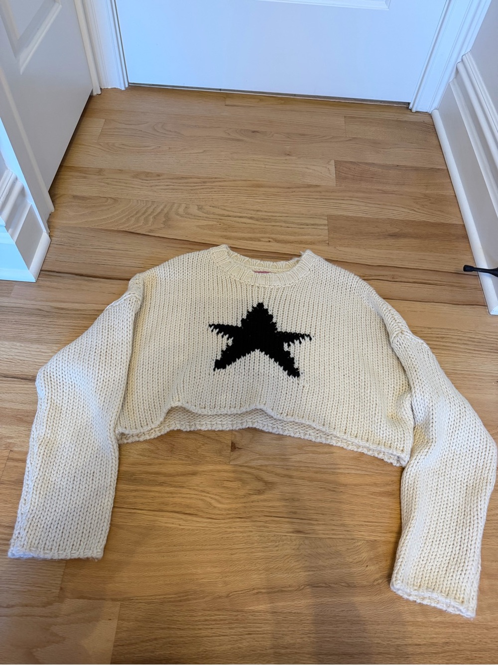 Edikted Cream Cropped Knit Sweater with Black Star Motif